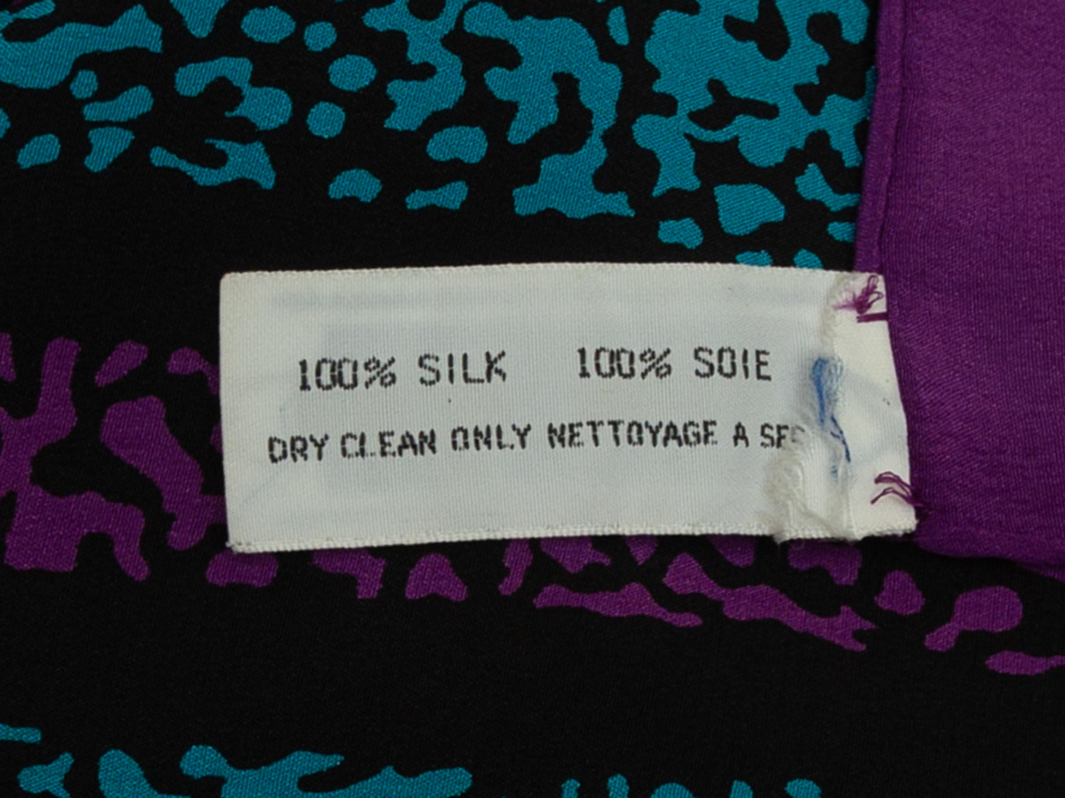 Product details: Vintage black, purple and turquoise silk scarf by Yves Saint Laurent. Striped print throughout. 34