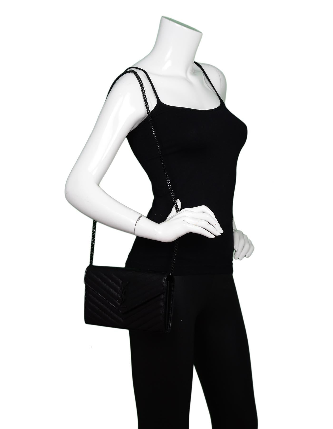 Yves Saint Laurent Black On Black Caviar Leather Grain De Poudre Matelasse Chevron Monogram YSL Clutch Bag/Chain Wallet WOC

Made In: Italy
Color: Black
Hardware: Black
Materials: Grain De Poudre leather
Lining: Black grained