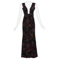 Yves Saint Laurent - Robe longue à décolleté plongeant en soie noire à pois convexes YSL, 1984