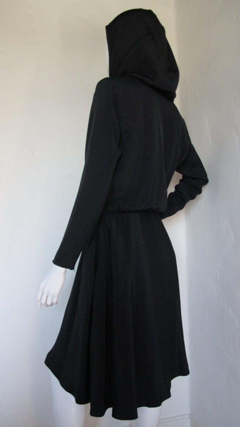 Yves Saint Laurent Black Silk Hooded Dress For Sale at 1stDibs | saint  laurent hooded dress, ysl hooded dress, ysl hood dress