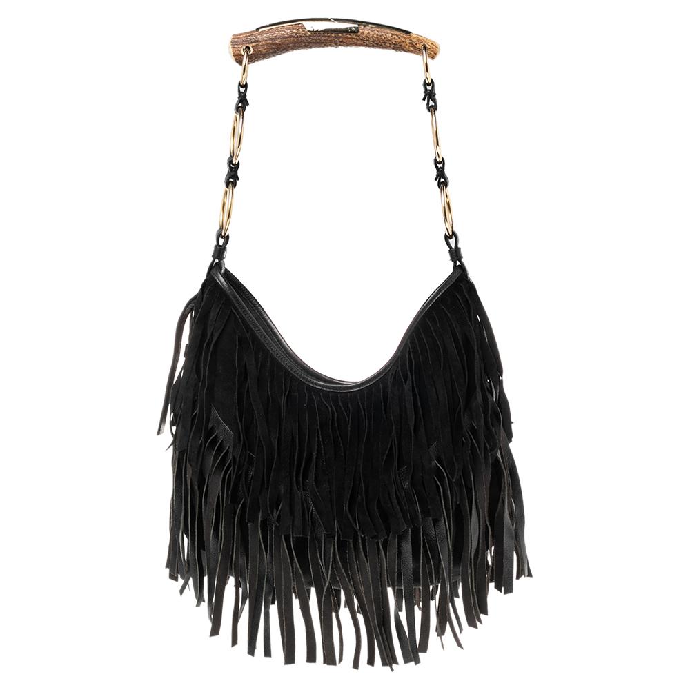 You wouldn’t want to miss this stylish and chic Mombasa hobo by Saint Laurent. Crafted with suede, it features an impressive shoulder strap with an eye-catching Mombasa handle to count on. This hobo is accentuated with attractive leather fringed
