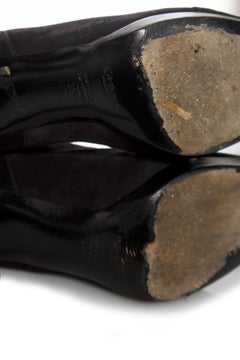 Yves Saint Laurent, black suede boots.