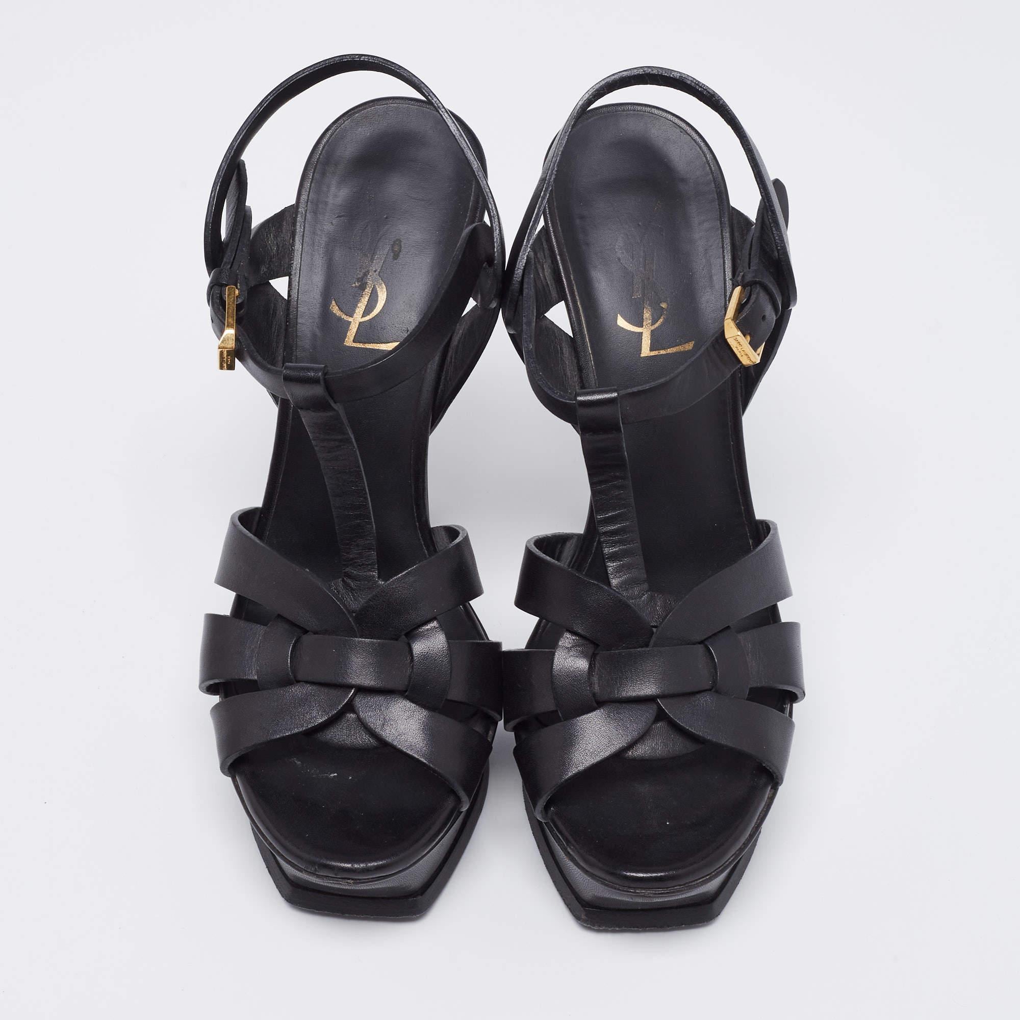 A timeless aesthetic and stellar craftsmanship in shoemaking are evident in these Yves Saint Laurent Tribute sandals. From their interwoven construction to the sturdy heels supported by platforms, these sandals can be styled with numerous outfits.

