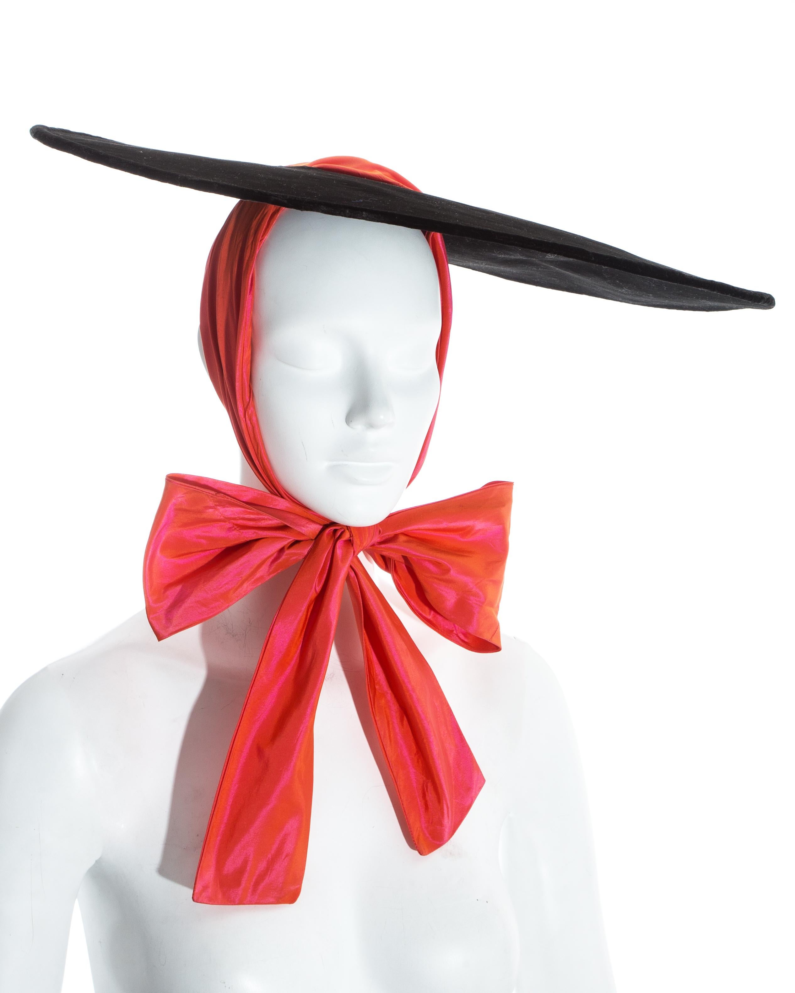 Black Yves Saint Laurent black velvet saucer hat with orange taffeta ribbon, fw 1995