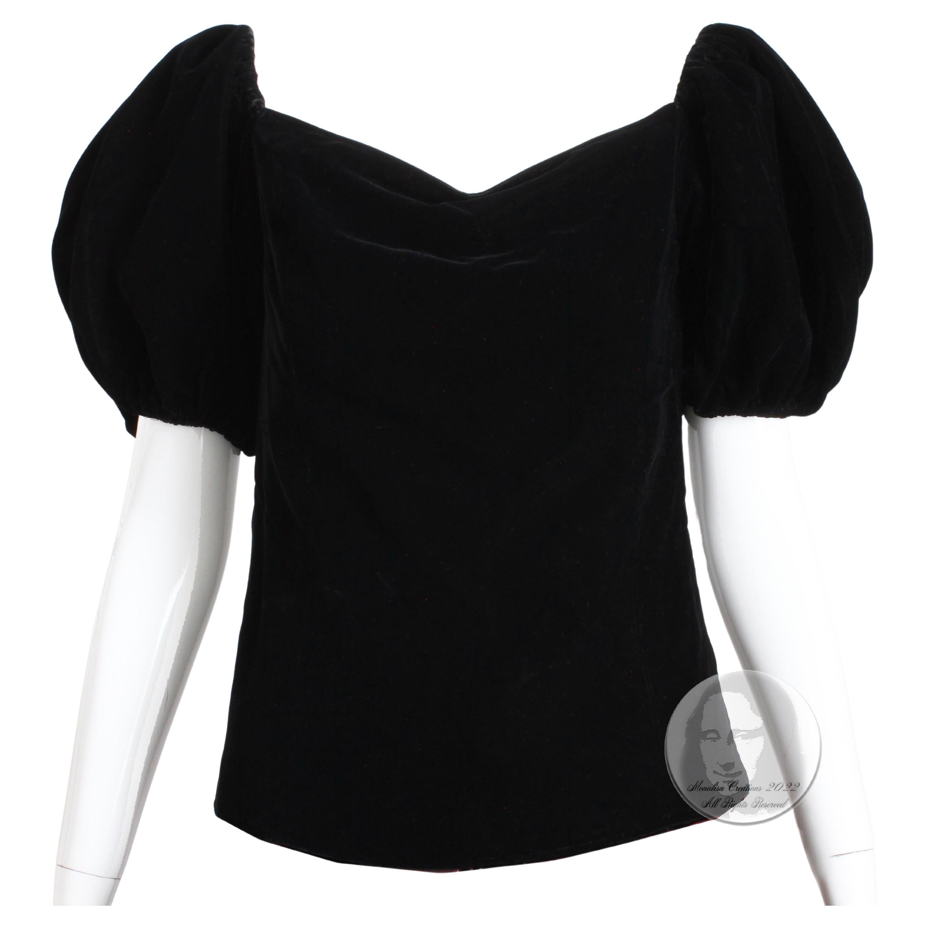 Authentic, preowned, vintage Yves Saint Laurent Rive Gauche puffed sleeve peasant blouse, likely made in the late 70s or early 80s.  Made from black velvet with elasticized sleeves, it's fully lined and fastens with a zipper under the wearers left