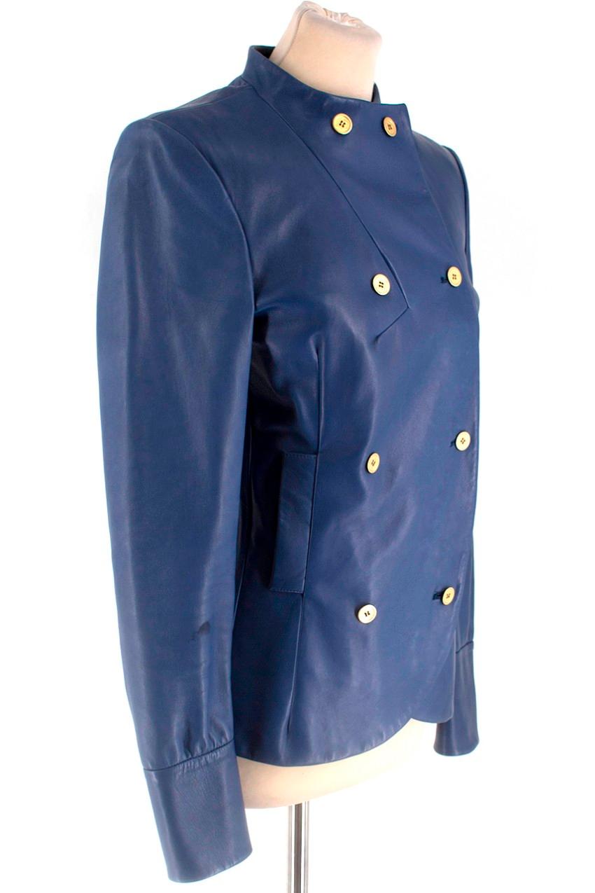Yves Saint Laurent Blue Leather Jacket

-Blue double breasted jacket
-Gold toned embossed buttons
-Buttons on cuffs
-Two front pockets

Please note, these items are pre-owned and may show signs of being stored even when unworn and unused. This is