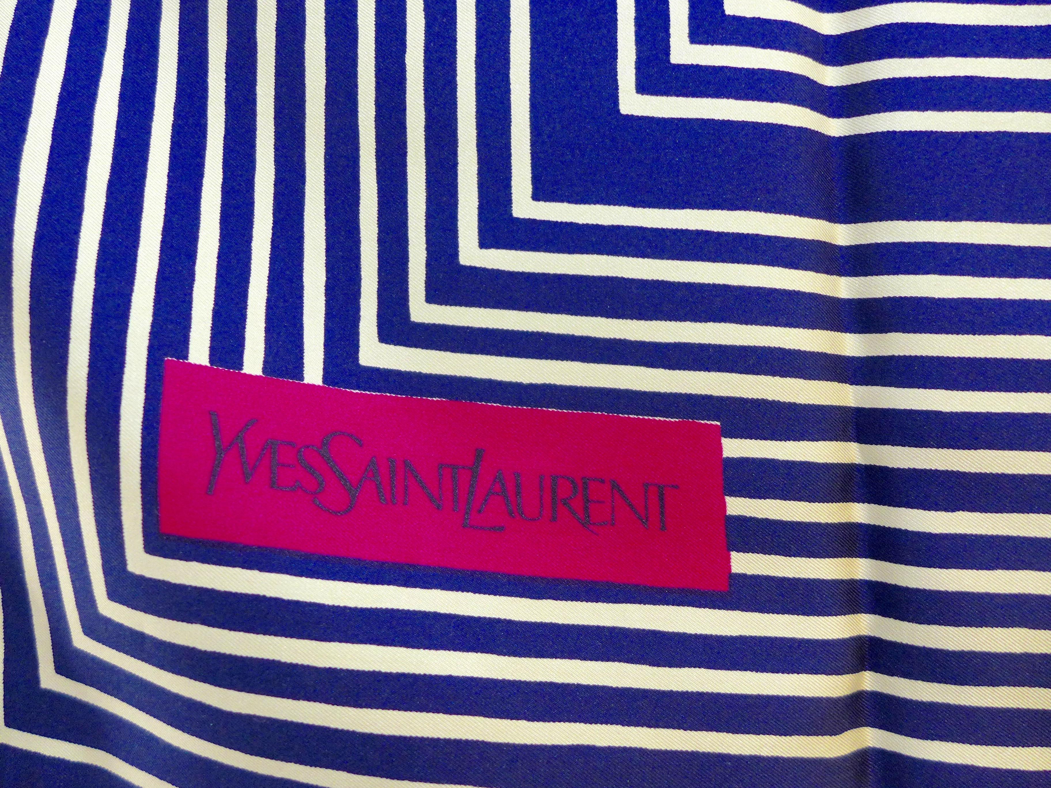 Made in France of pure silk and finished by hand with finely rolled hand-stitched edges, this eye-catching YSL scarf is 35