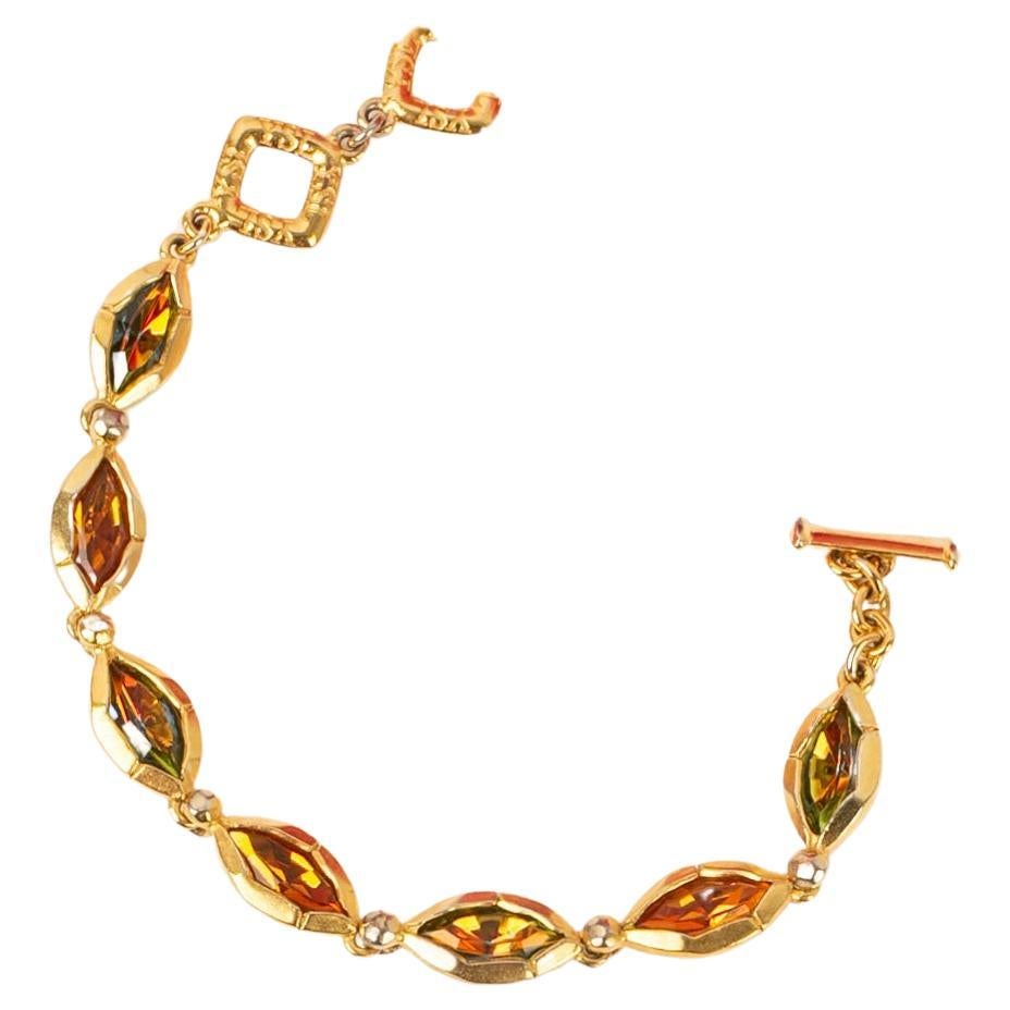 Yves Saint Laurent Bracelet in Gold-Plated Metal and Orange Rhinestones For Sale