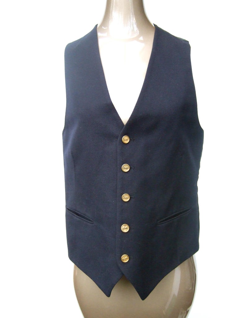 Yves Saint Laurent Gilet unisexe en laine bleu foncé avec boutons YSL en  laiton pour hommes, années 1970 En vente sur 1stDibs