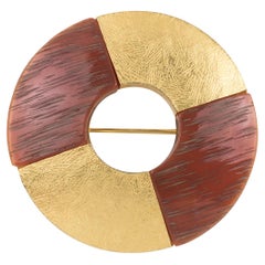 Yves Saint Laurent YSL Broche de donut dorado y resina