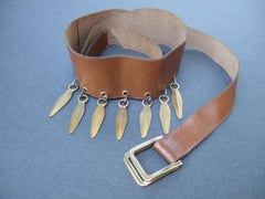 Yves Saint Laurent Brown Leather Dangling Gilt Metal Spike Charm Belt c 1970s