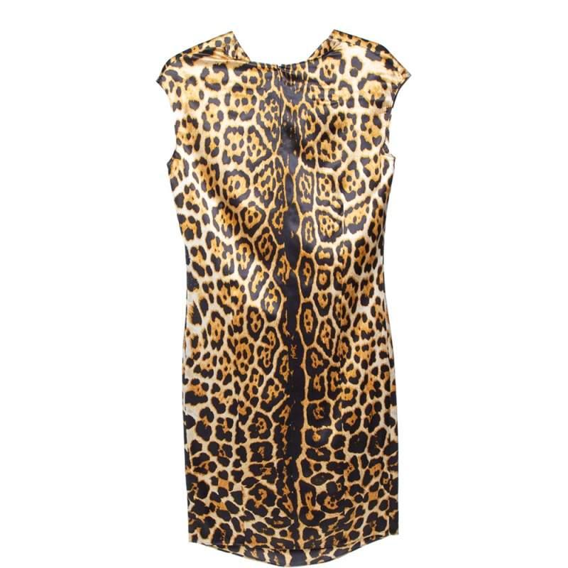 This dress is an example of Yves Saint Laurent's smart aesthetics put together with brilliant tailoring. The shift dress has a leopard print along with a sleeveless style and cowl neckline. It is bound to look great with solid black
