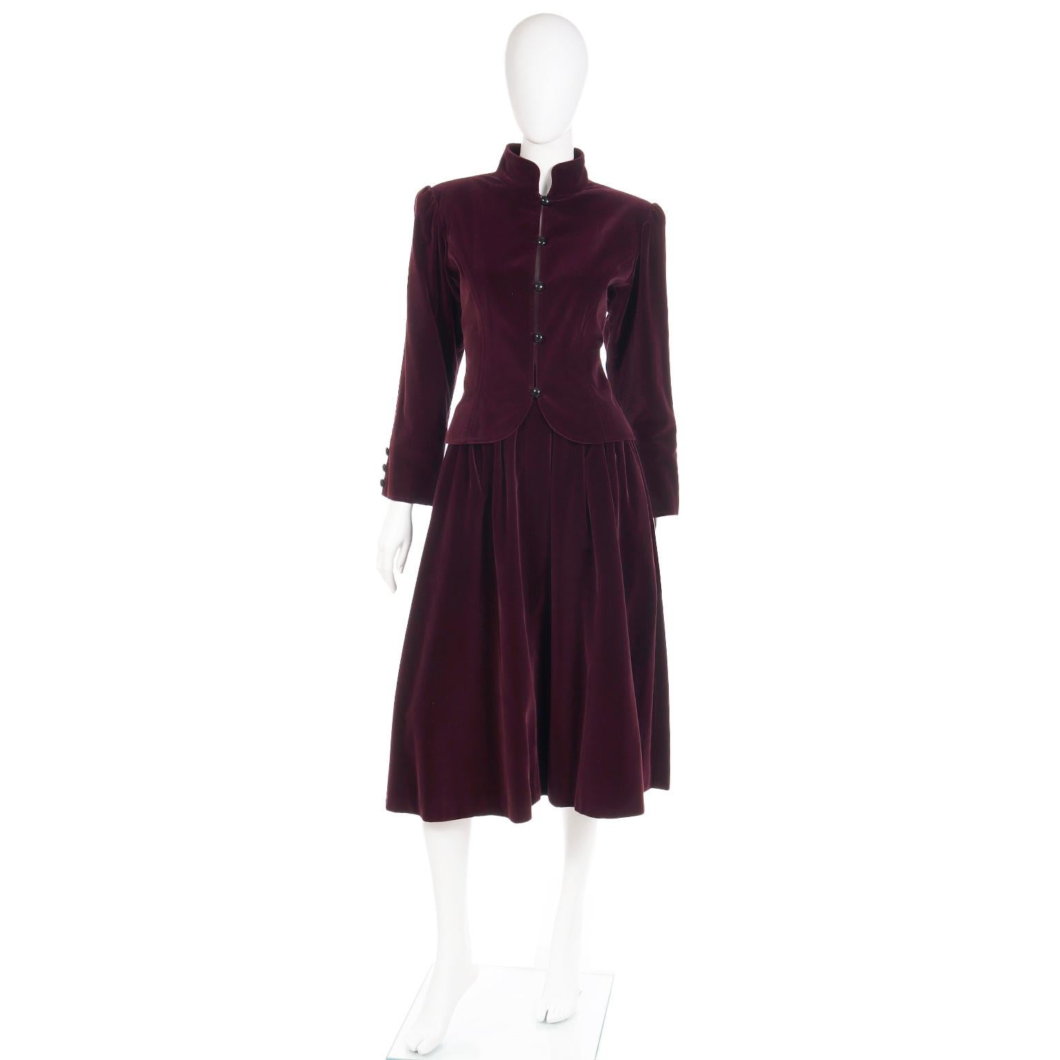This is an outstanding Yves Saint Laurent burgundy/wine velvet skirt and jacket ensemble from the early 1980's. YSL continued to be inspired by Russian Czar era clothing and the costumes from Ballet Russes. He incorporated modern elements and