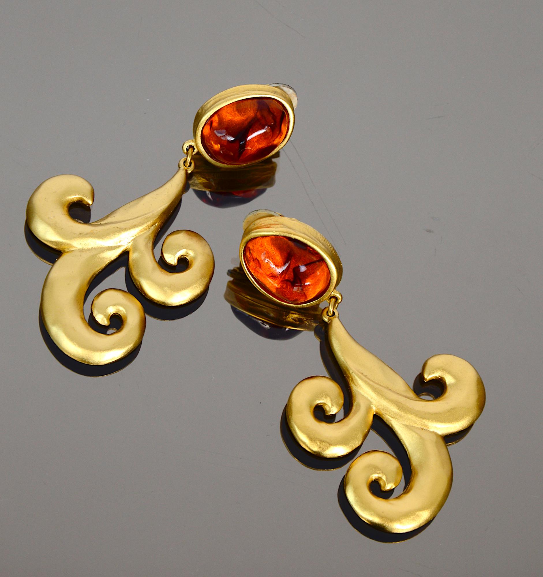 Vintage and very rare to find Yves Saint Laurent 1980s statement amber and gold metal clip-on earrings. 
100% Genuine. 
Signed YSL at the rear.
In beautiful vintage condition 
Total Length 3,3inch/8cm
