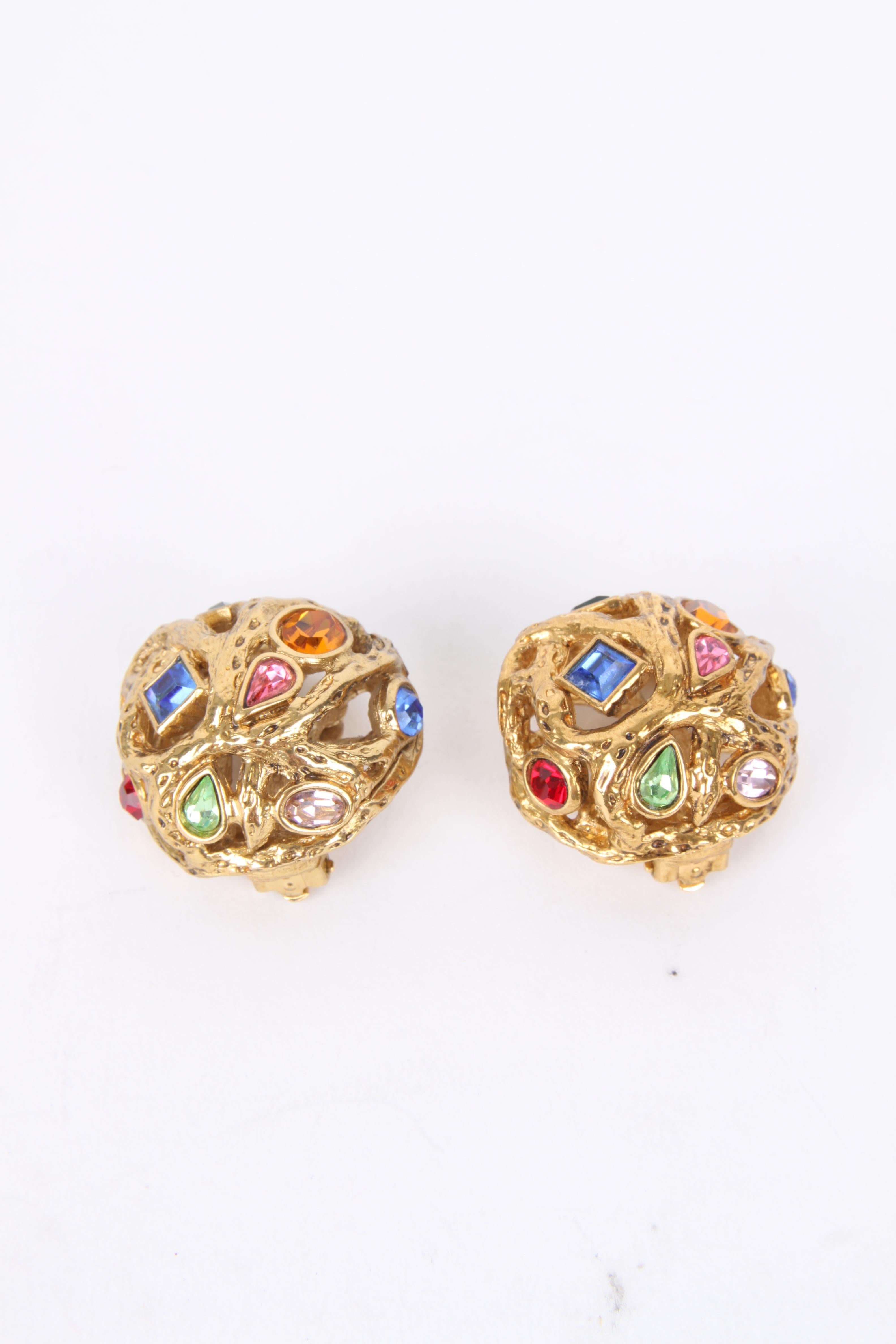 Yves Saint Laurent by Robert Goossens Gold Multicolour Rhinestone Clip-On Earrings

These earrings feature a lux gold-plated openwork exterior with a red/orange/pink/blue and green rhinestone embellished finish. The earrings feature a gold-plated