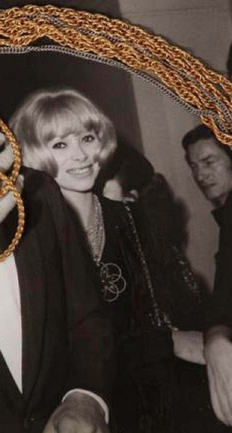 YVES SAINT LAURENT by ROGER SCEMAMA vintage massive flower pendant featuring marbled faux stones (deep red/plum/amber - difficult to say) resin cabochons.

Similar pendant worn by French actress MIREILLE DARC (see picture).
Similar model (in a