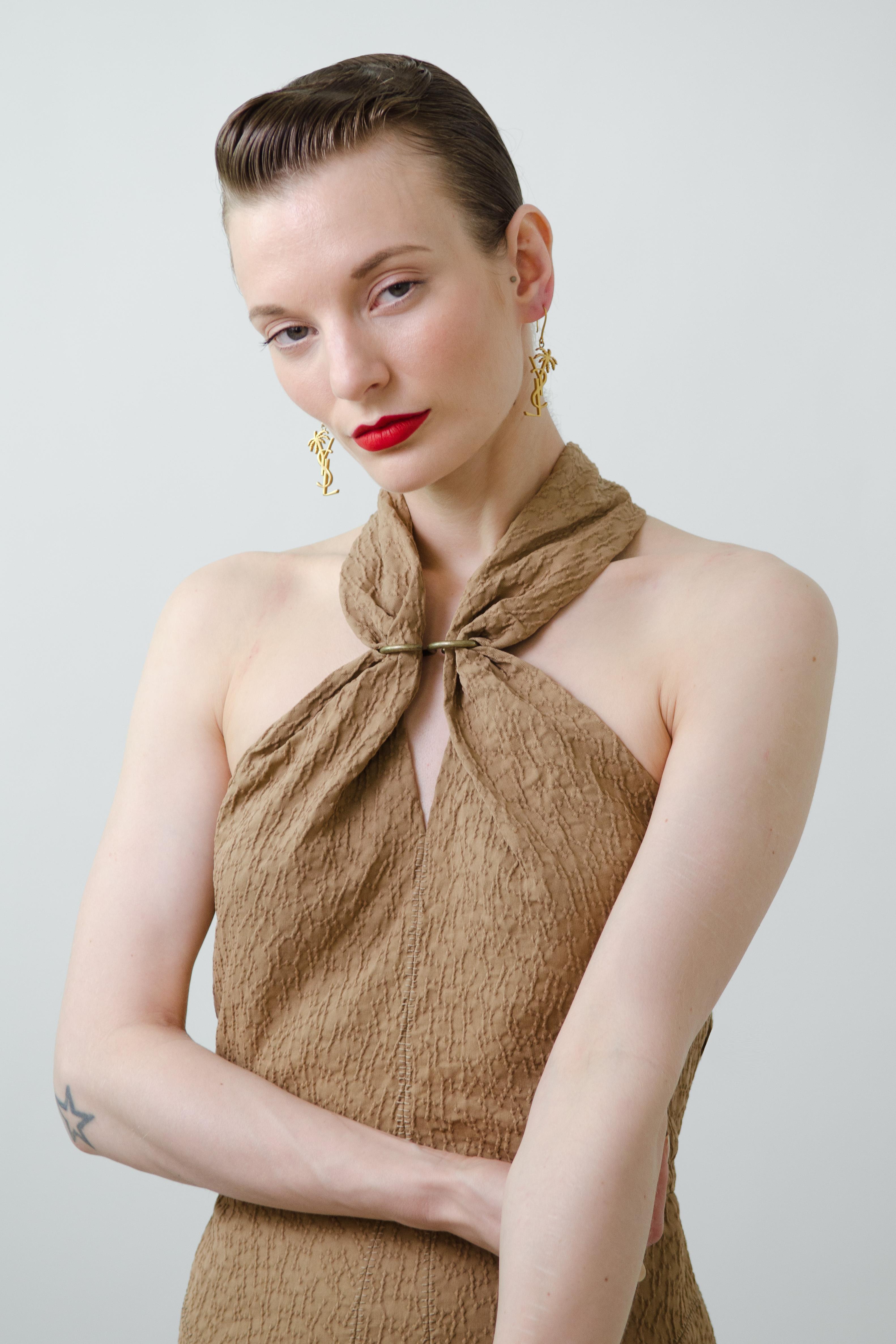 Yves Saint Laurent by Stefano Pilati Spring Summer 2011 textured runway dress

Brand: Yves Saint Laurent
Designer: Stefano Pilati
Collection: Spring Summer 2011
Fabric: Cotton / wool / silk
Color: Beige with bronze details
Size:  FR38

For his