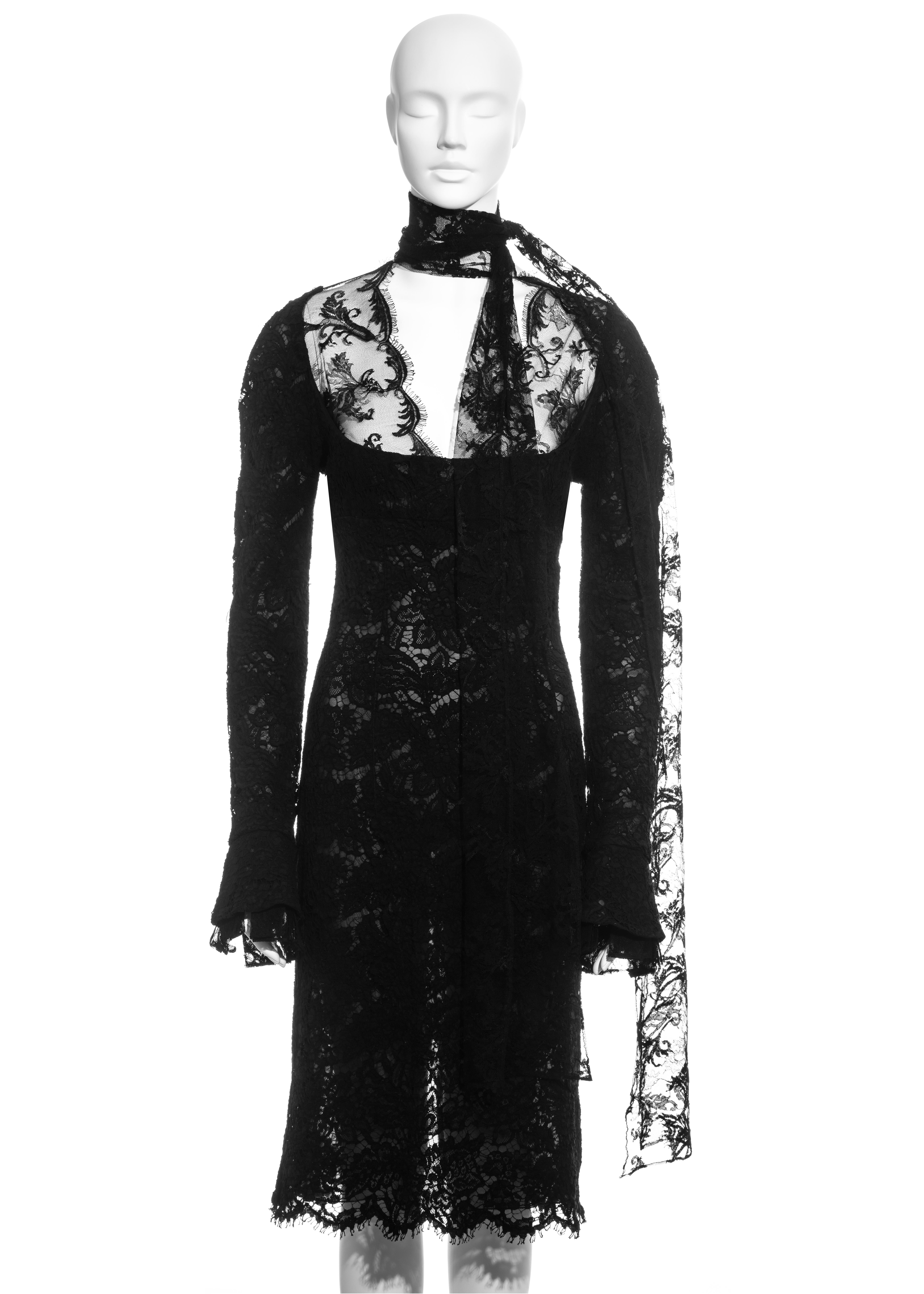 ▪ Black lace long-sleeve evening dress
▪ Silk organza lining 
▪ Long scarf neck fastening 
▪ Dropped pleated cuffs
▪ Bust 34