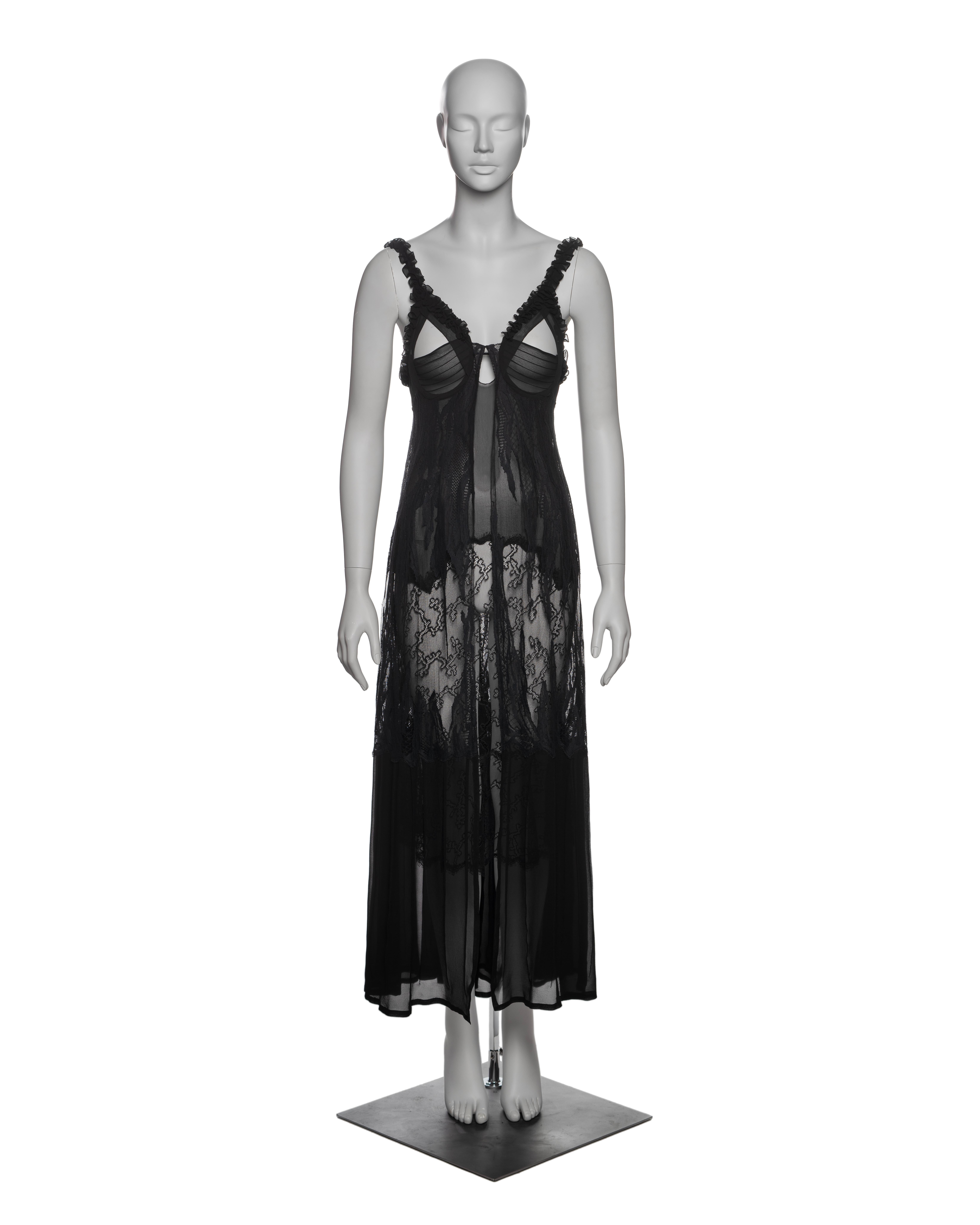 ▪ Brand: Yves Saint Laurent
▪ Creative Director: Tom Ford
▪ Collection: Fall-Winter 2003
▪ Fabric: Silk, Lace
▪ Details: This black sheer evening dress is made of silk and lace. It features a fitted bodice with pin-tucked cut-out details on the bust