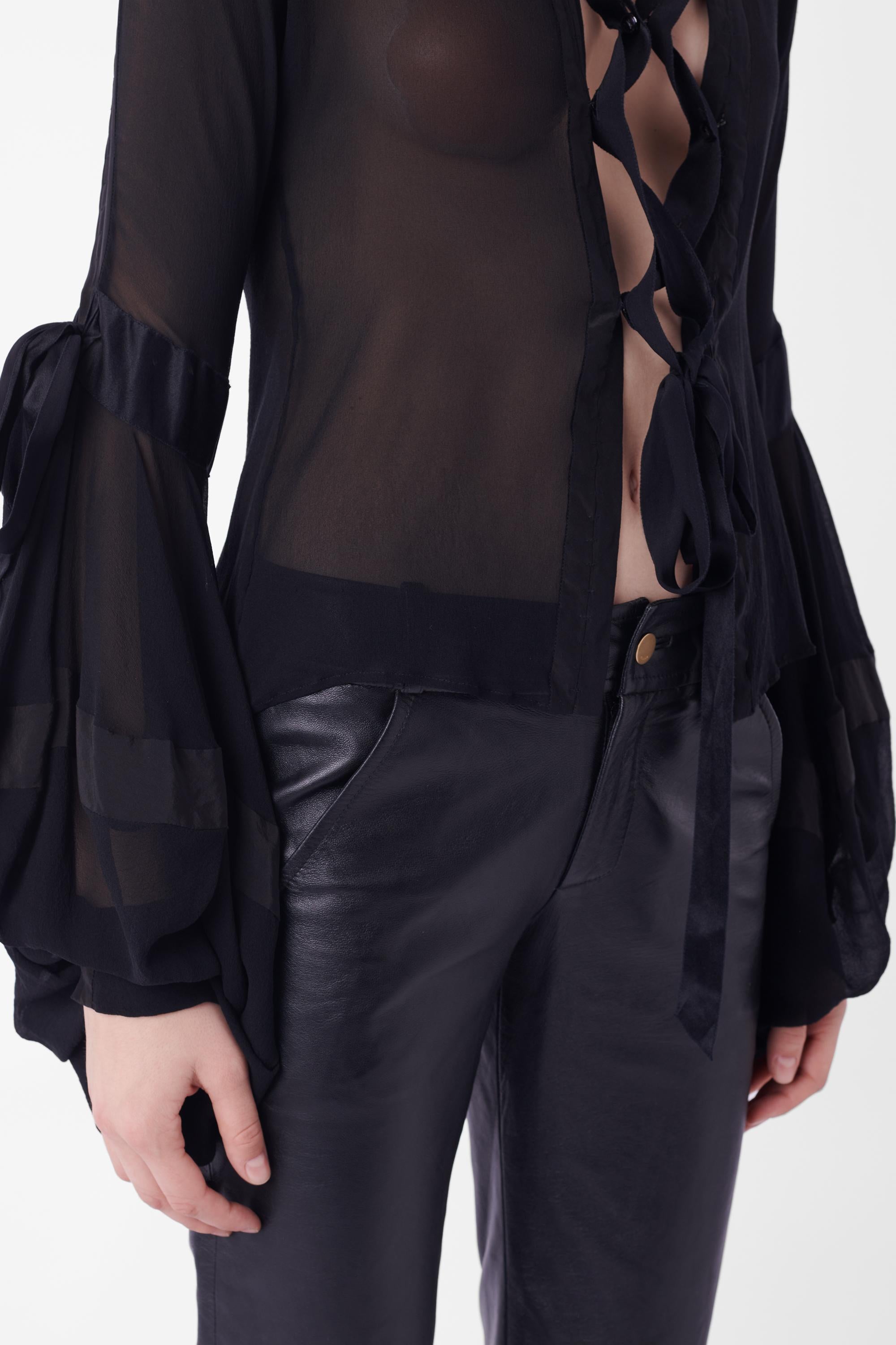 Black Yves Saint Laurent by Tom Ford Fall Winter 2002 lace up front black blouse. Runw For Sale