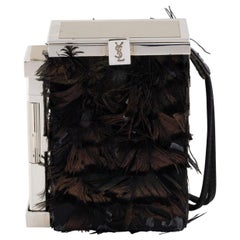 Yves Saint Laurent by Tom Ford feathered case with lighter