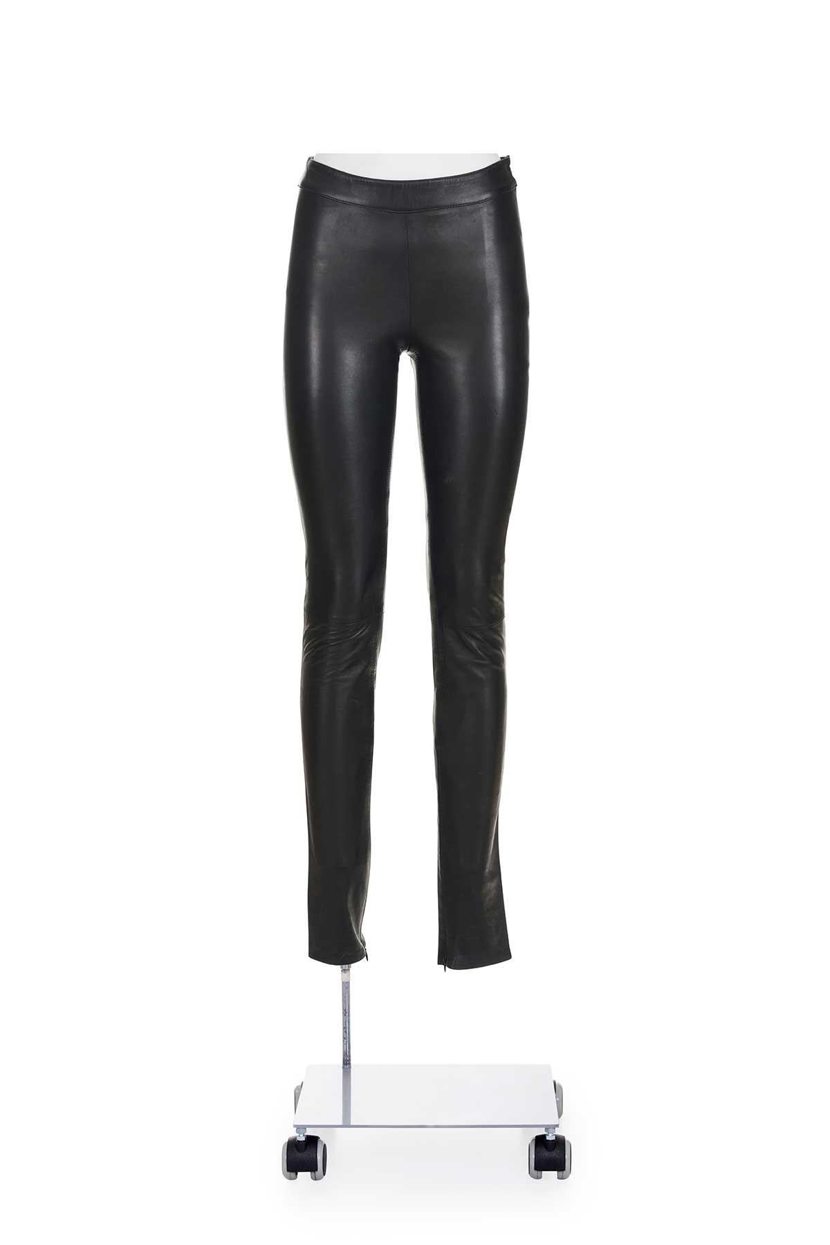 Fall Winter 2003 iconic fully lined skinny leather trousers by Tom Ford for Yves Saint Laurent.
Lace detail on the back
Sided zip 
The composition is 100% genuine leather
The composition of the lining is 68% acetate 32% polyester

