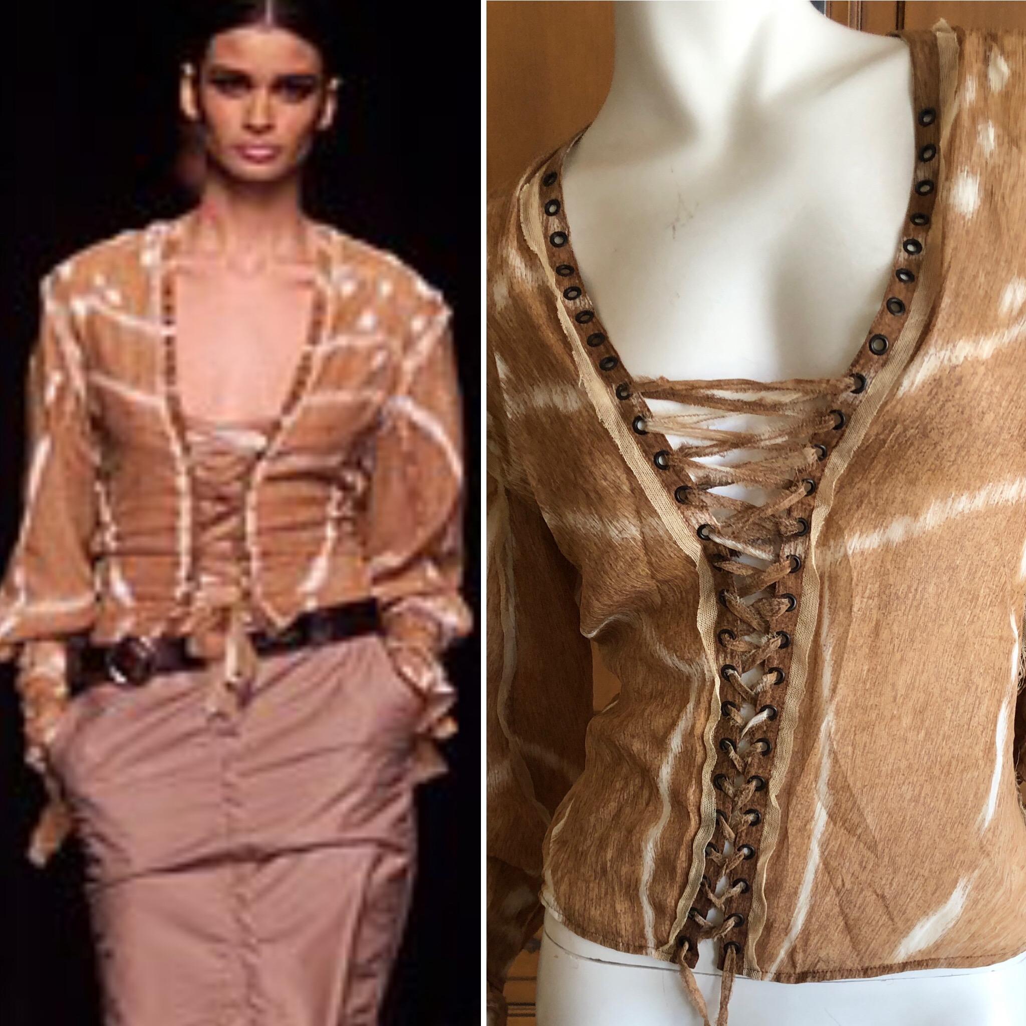 Yves Saint Laurent by Tom Ford Mombassa Collection Silk Corset Lace Up Top.
Please use the zoom feature to see all the details, laces up the back under the top layer, so chic.
Size 40
Bust  34