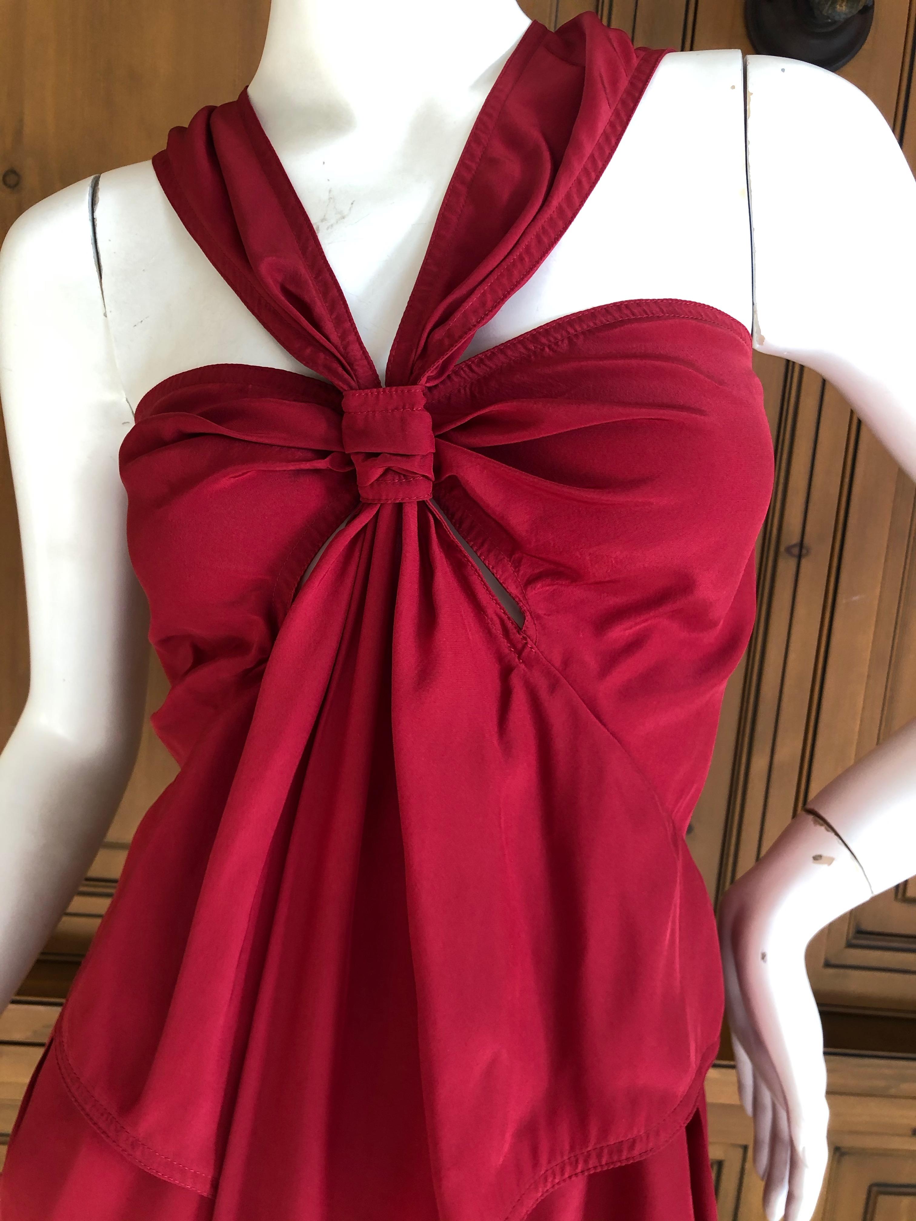 Yves Saint Laurent by Tom Ford Red Silk Keyhole Dress
I'm not certain how to style this, there is a side sash type flap at the hip, I'm not sure I styled correctly.
As seen on Meg Ryan in Harpers Bazaar and in the Tom Ford book.
Size 40
 Bust