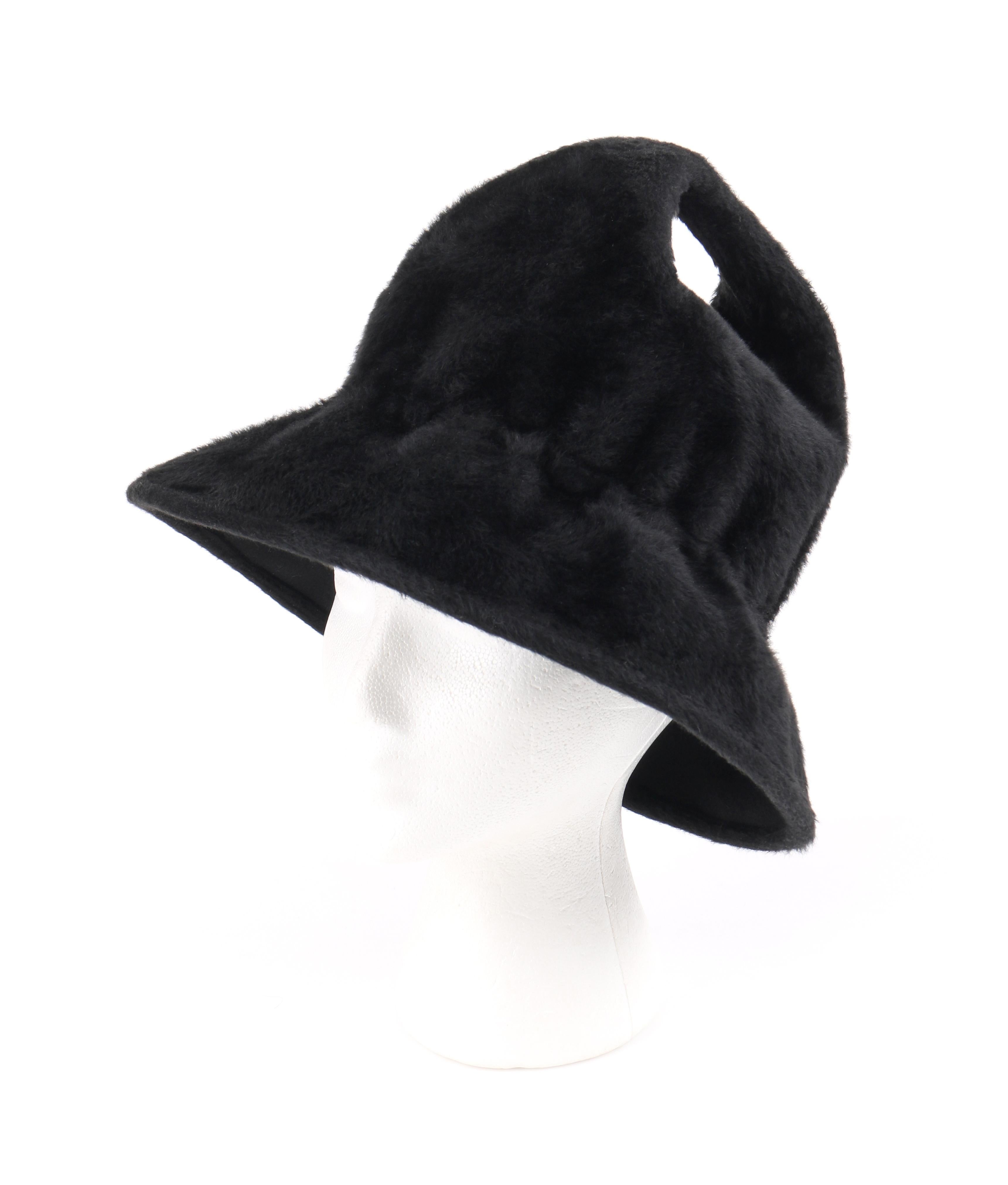 YVES SAINT LAURENT c.1960’s YSL Black Felted Angora Fur Top Handle Structured Bucket Hat
 
Circa: 1960’s
Label(s): Yves Saint Laurent / Paris - New York / Union Made
Style: Bucket Hat
Color(s): Black
Lined: No 
Unmarked Fabric Content: Felted