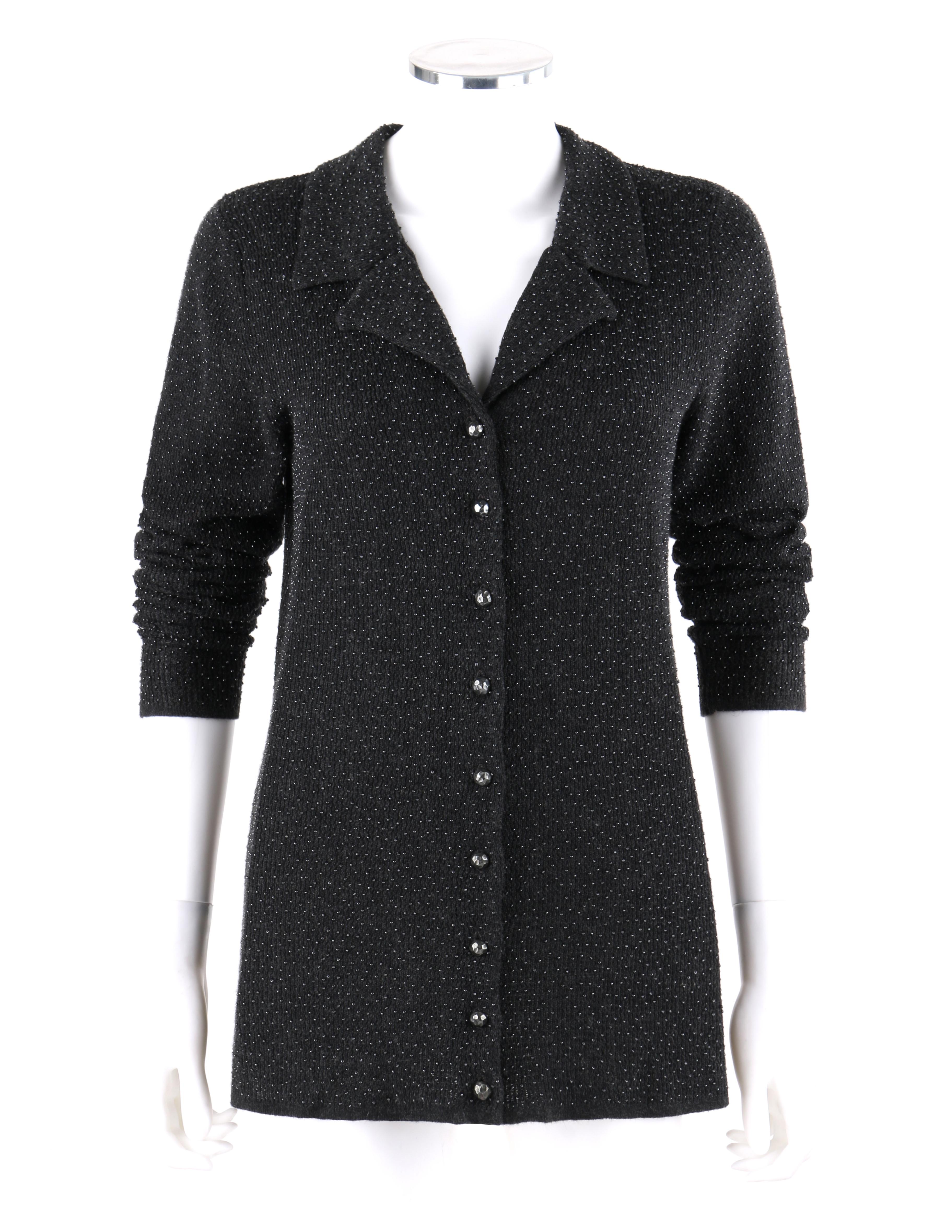 YVES SAINT LAURENT Rive Gauche Dark Gray Bead Embellished Silk Cashmere Button Front Cardigan Sweater
 
Circa: 1980’s
Label(s): Yves Saint Laurent / Rive Gauche 
Style: Cardigan
Color(s): Gray
Lined: No
Marked Fabric Content: 55% Silk; 45% Cashmere 
