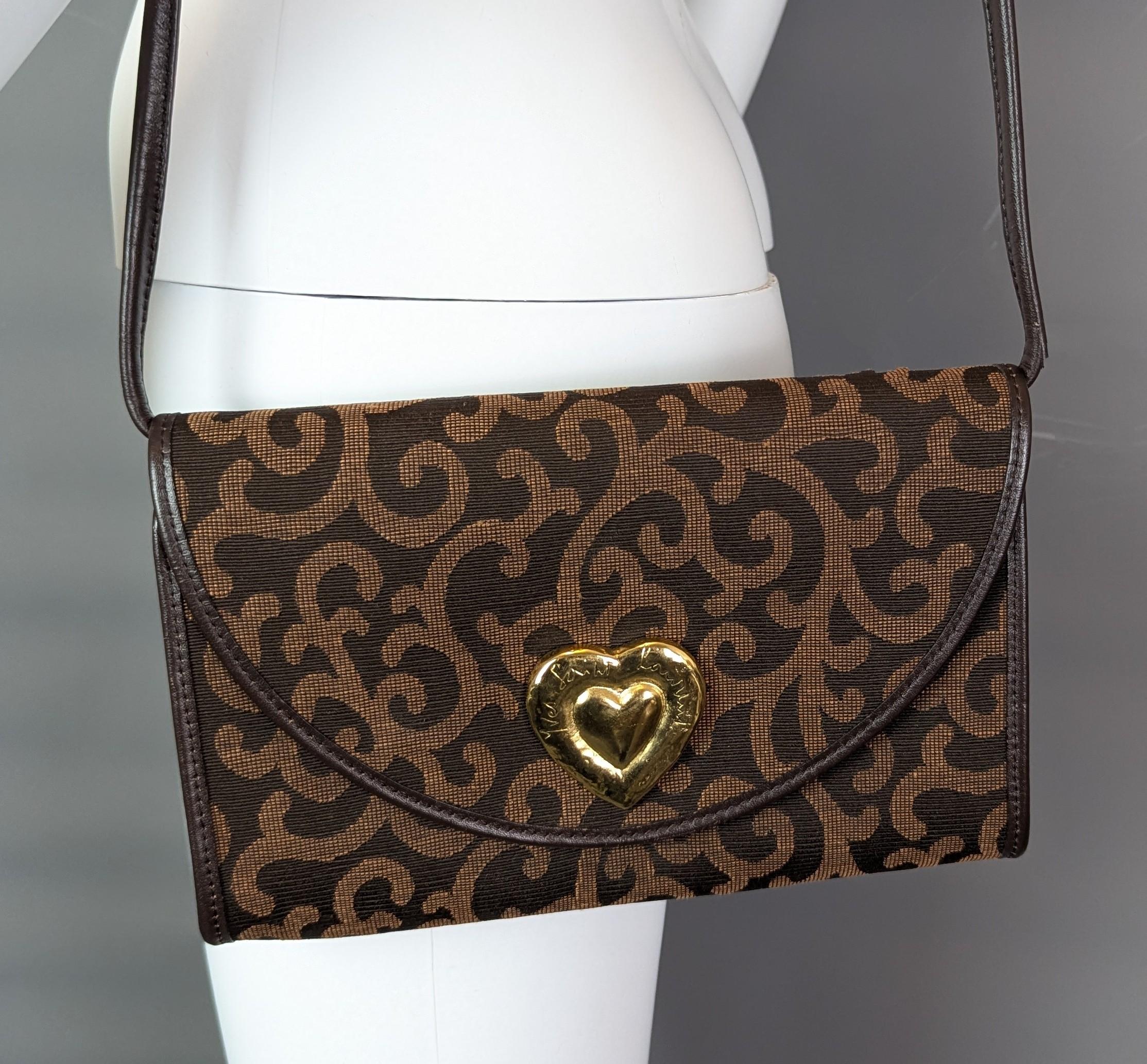 Bolso bandolera de lona Yves Saint Laurent, corazón dorado en venta 5