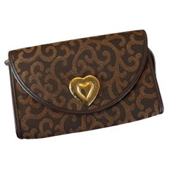 Yves Saint Laurent canvas shoulder bag, gold tone heart