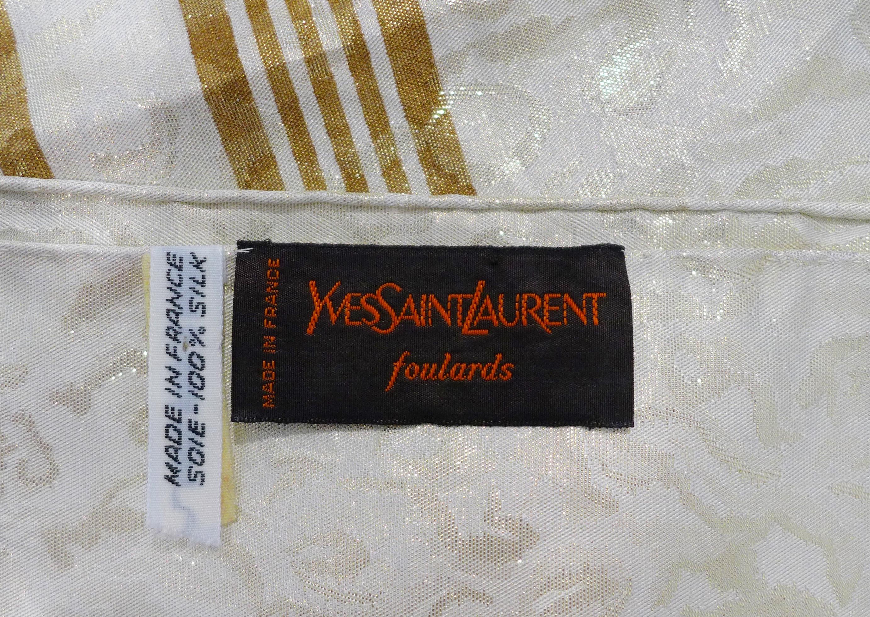 Made in France of pure silk and finished by hand with finely rolled hand-stitched edges, this eye-catching YSL scarf is 54