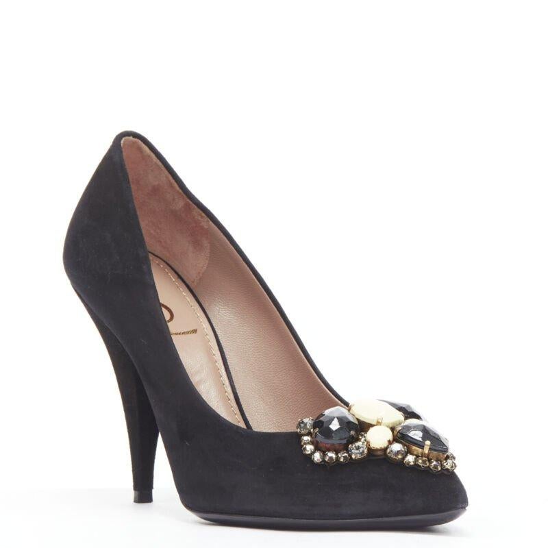 YVES SAINT LAURENT Charlie 105 black suede rhinestone jewel heel pump EU37.5
Reference: MELK/A00201
Brand: Yves Saint Laurent
Model: Charlie 105
Material: Suede
Color: Black
Pattern: Solid
Lining:  Leather
Made in: Italy

CONDITION:
Condition: