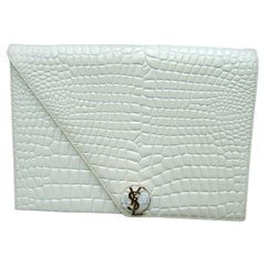 Vintage Yves Saint Laurent Chic Embossed Cream Leather Clutch c 1980s