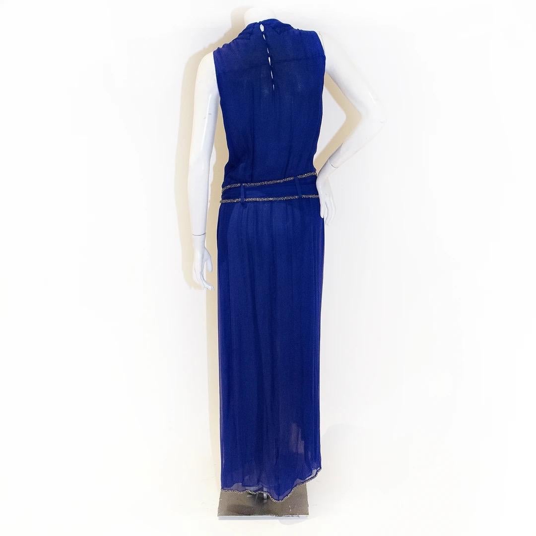 Yves Saint Laurent by Stefano Pilati Gown 
Made in France 
Royal blue 
Silk chiffon 
Silver bead embellished details 
Drop waist style silhouette 
Drop waist has belt with silver beaded embellishments 
Button closures down back of gown
Slit up front