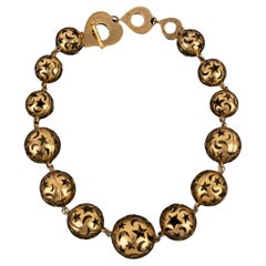 Collana girocollo Yves Saint Laurent anni 
80