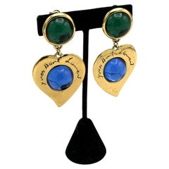 Yves Saint Laurent clip-on earring with green und blue rhinestones, France 1980s