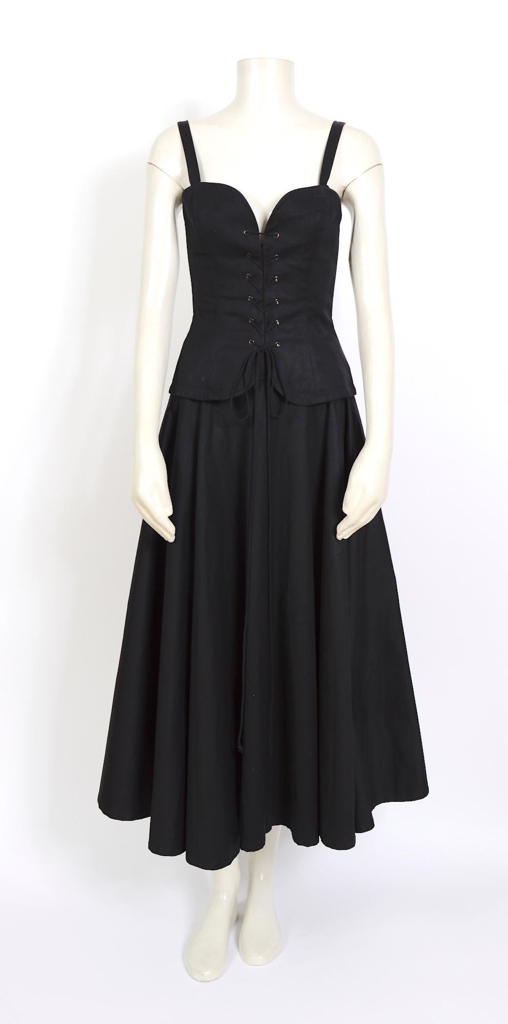 Beautiful highly collectible Saint Laurent vintage early 80s lace-up top and full circle skirt set. 
Made in 100% cotton.
Excellent pre-owned condition.
Top french size 38
Skirt French size 40
Please consult the given measurements for the perfect