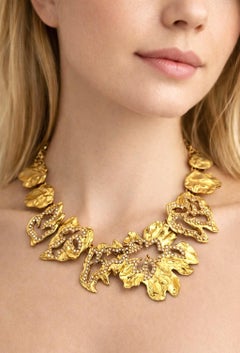 YVES SAINT LAURENT colllier consi of different leaves with tiny rhinestones deco