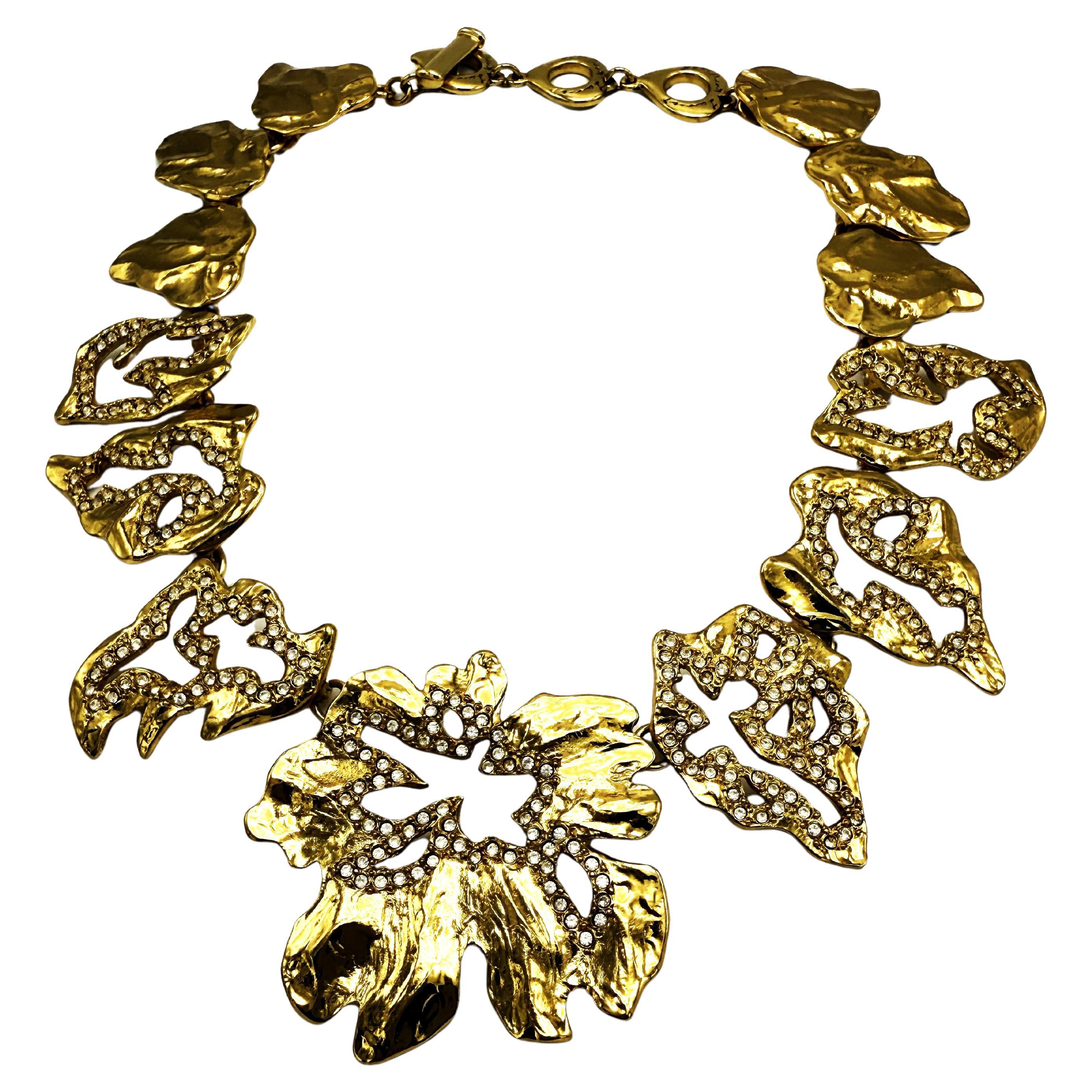 YVES SAINT LAURENT colllier consi of different leaves with tiny rhinsetons