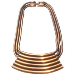 Vintage Yves Saint Laurent Copper Metal Grooved Pendant Choker Necklace c 1970s