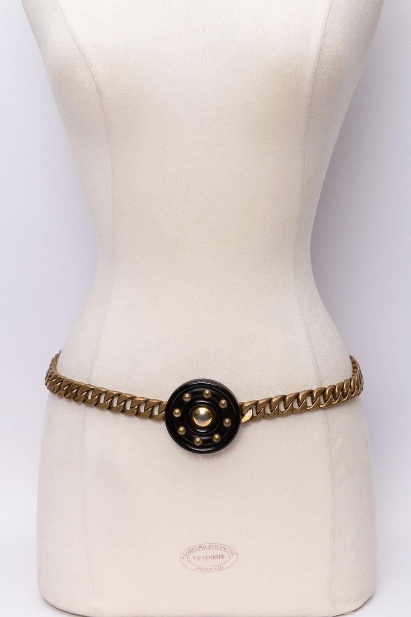 Yves Saint Laurent - Curb chain belt in copper-tone metal with a  resin buckle looking like wood.

Additional information:
Condition: Very good condition
Dimensions: Length: 77 cm (30.31