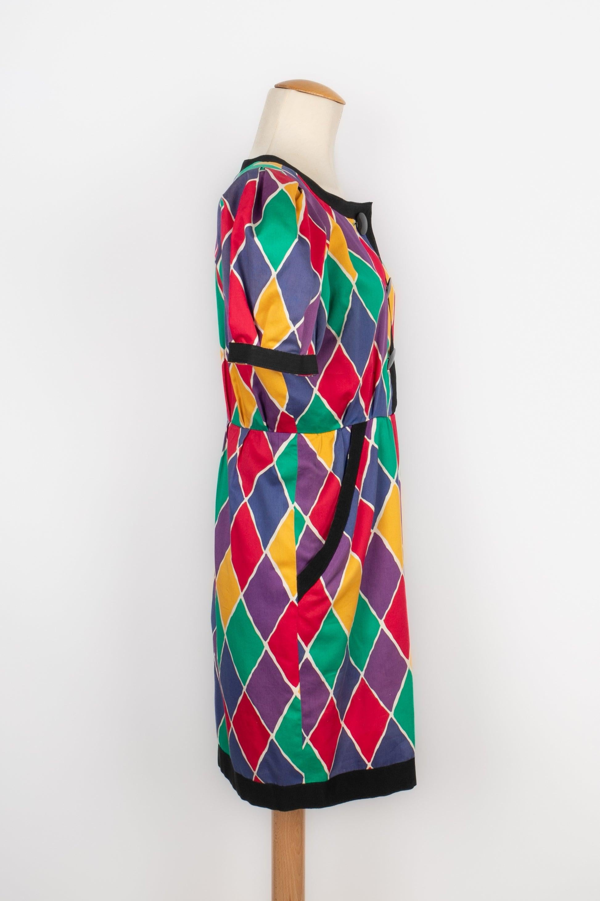 Yves Saint Laurent - (Made in France) Cotton mid-length dress with a multicolored 'Harlequin' print and puffy sleeves. Size 38FR. 1988 Spring-Summer Collection.

Additional information:
Condition: Very good condition
Dimensions: Shoulder width: 36