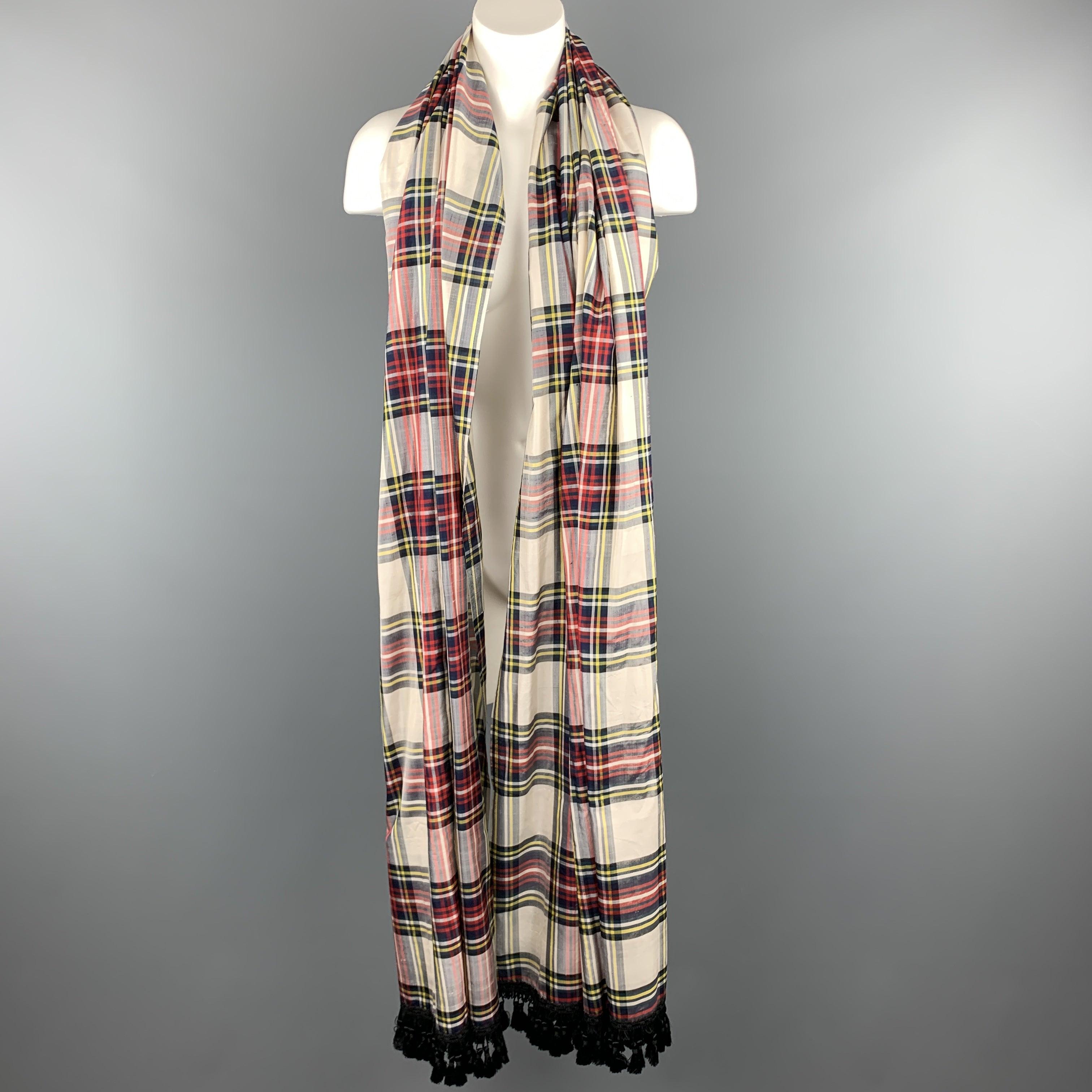 Vintage YVES SAINT LAURENT Rive Gauche shawl scarf comes in cream taffeta with an all over plaid pattern with black tassel fringe trim. Care tag cut. As-is. Made in France.Excellent
Pre-Owned Condition.98 x 43 inches 
  
  
 
Reference: