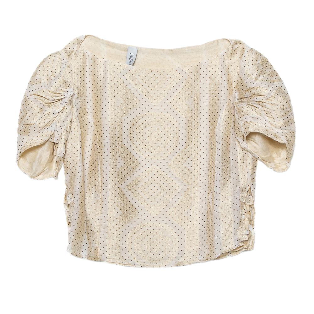 Yves Saint Laurent offers a diverse range of the best styles and this top vouches for it. The subtle use of color and pattern on this top is eye-pleasing. Made from silk blend, this top is a must-have in every dresser to include some in-vogue