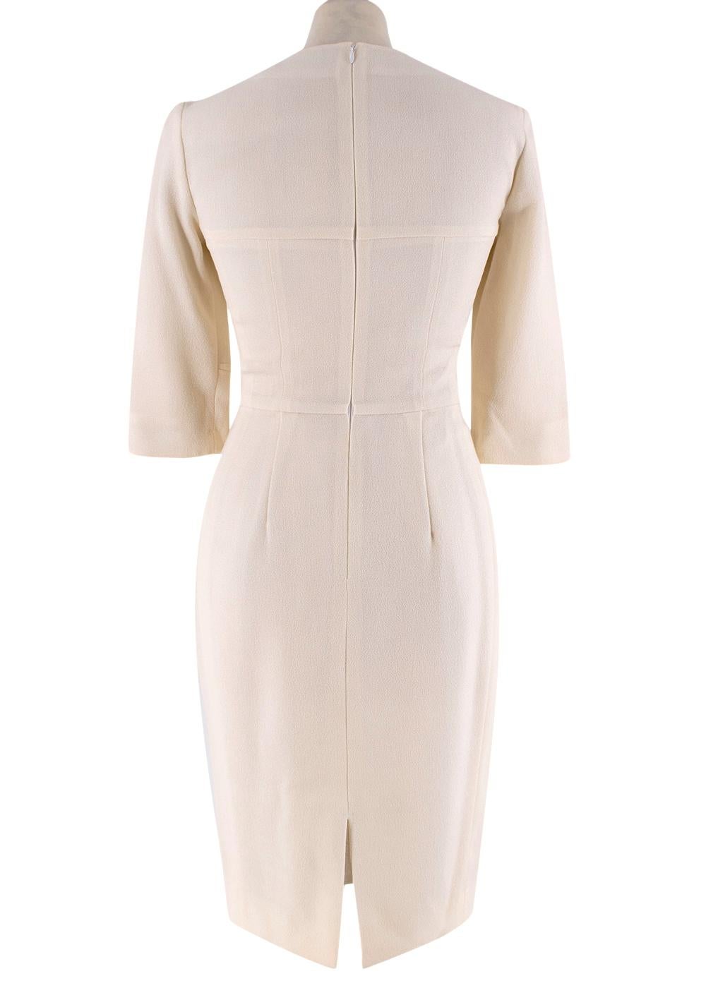 Yves Saint Laurent Cream Fitted Dress

- Textured silk
- Knee length skirt
- Quarter length sleeves
- Round neck fastening
- Accentuated waist

Made in France

Fabric Composition:
Silk Blend

THERE IS NO SIZE /CARE LABEL, HOWEVER BASED ON THE VIP