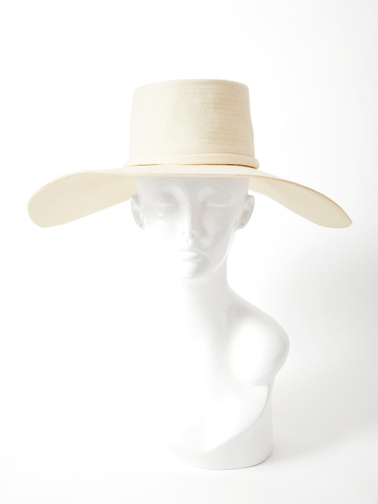Yves Saint Laurent, wool flannel, cream tone, wide brim hat, having top stitching detail along the crown and brim.