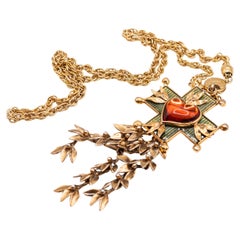 Yves Saint Laurent, collier pendentif croix par Goossens