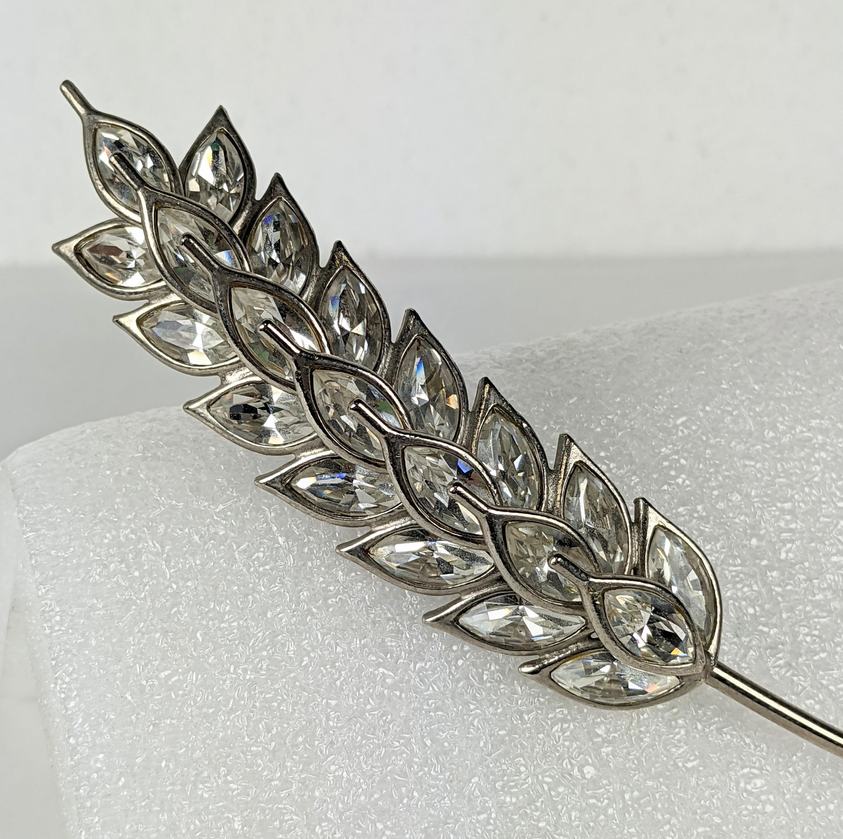 Yves Saint Laurent Crystal Wheat Brooch, by Maison Goossens, Paris. Beautiful construction, multi layered and large imposing scale set in silver plate metal. 1990's France.
6